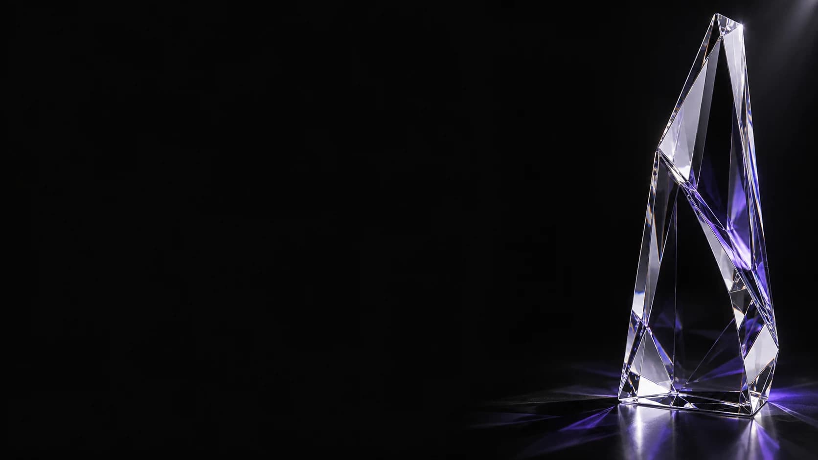 A faceted crystal refracting violet light — the Flightdeck identity